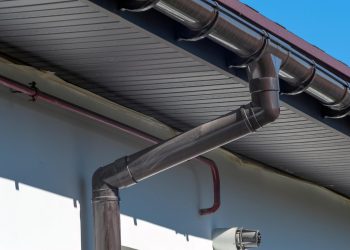 How Does Pressure Washing Improve Gutter Efficiency?