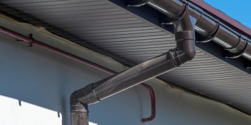 How Does Pressure Washing Improve Gutter Efficiency?