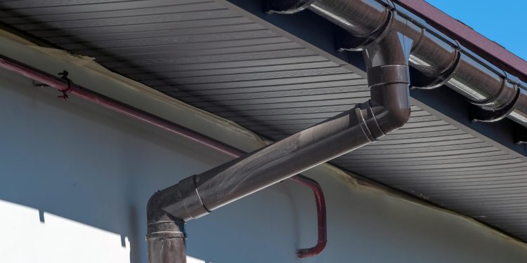 How Does Pressure Washing Improve Gutter Efficiency?